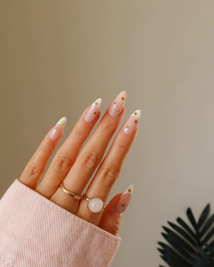 These French Nails with Gold Stars are perfect for Christmas nail colors