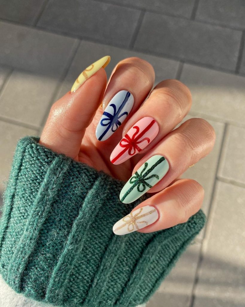  These Wrapped Gift Nails are perfect for this holiday season