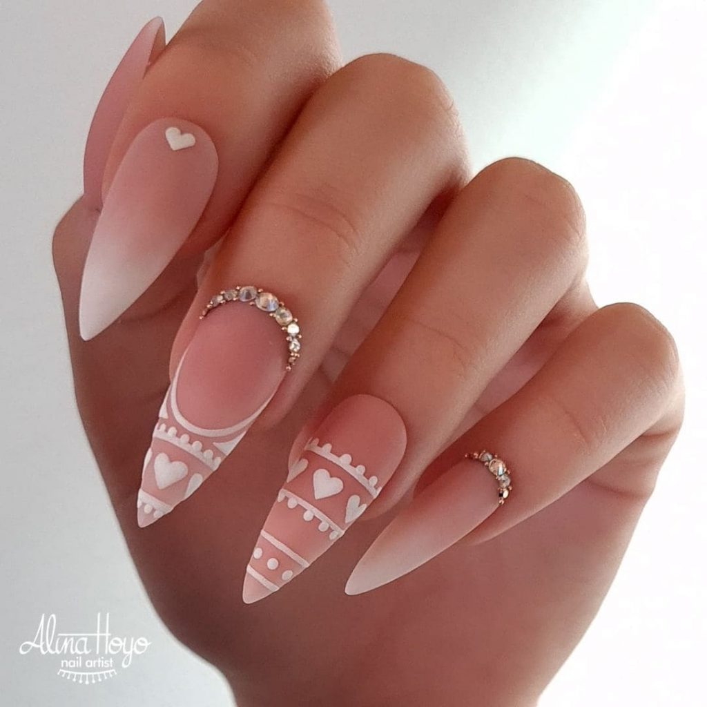 These white nails will be fabulous for a valentine day treat