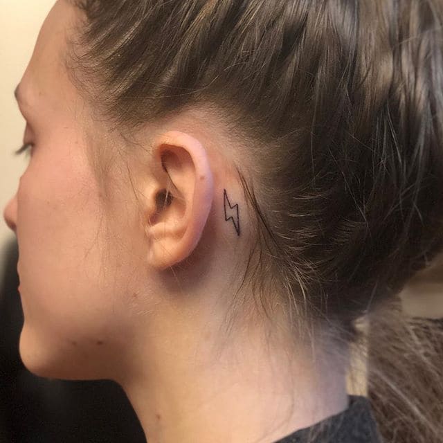lightning strike behind the ear tattoo
