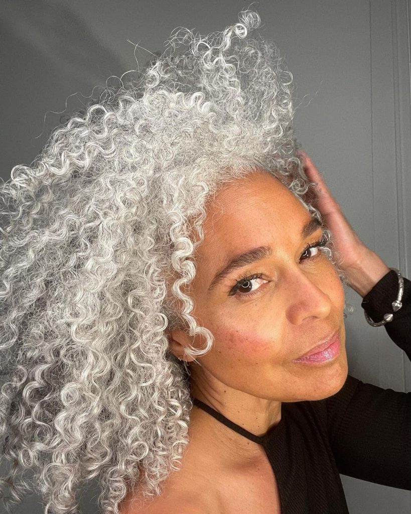 black woman with white gray curls