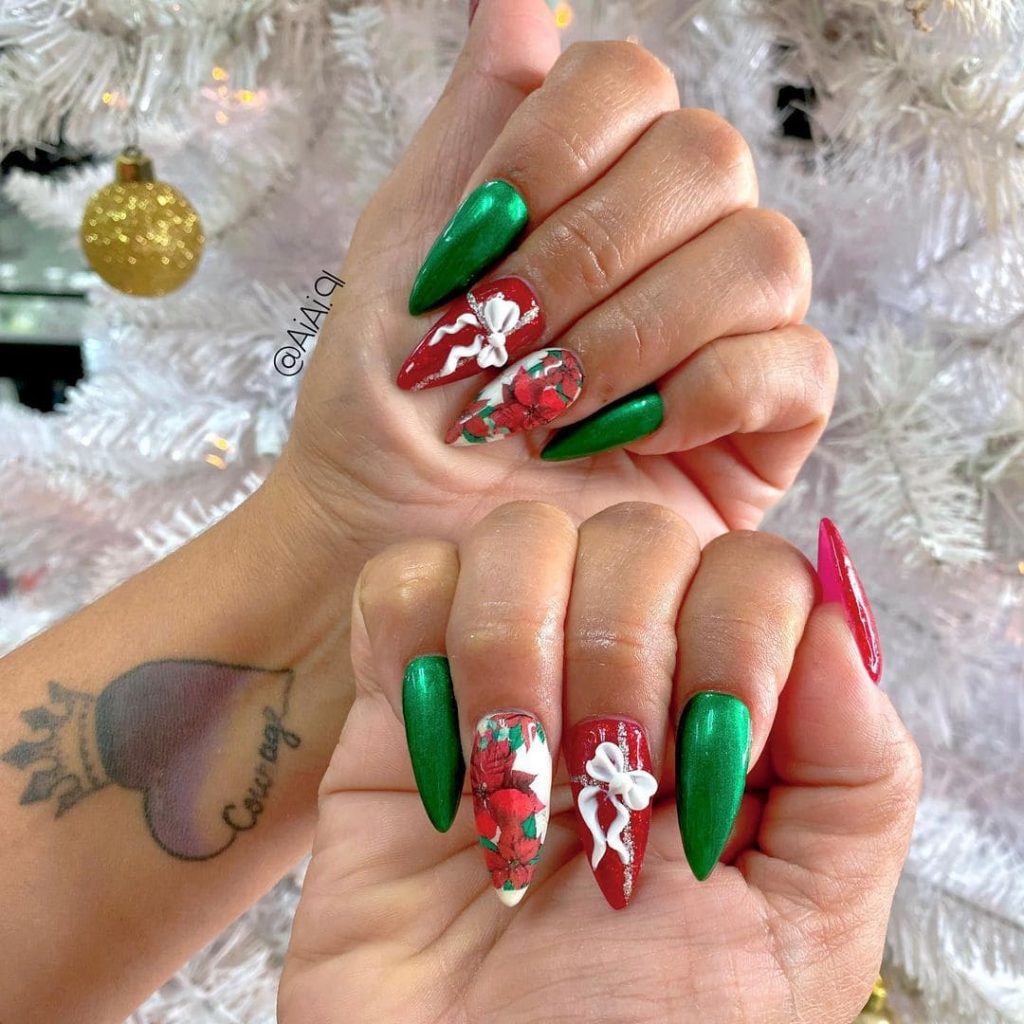 red and white candy cane Christmas nails