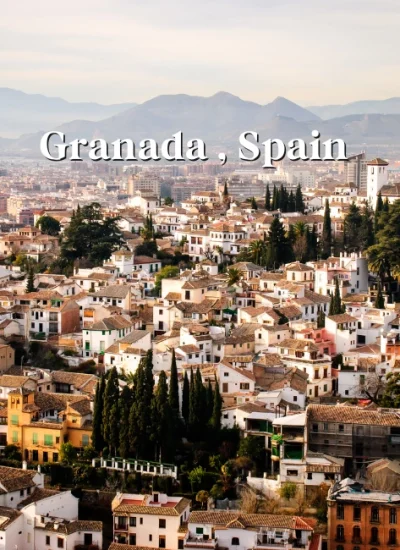 Scenic view of Granada, Spain, with historic buildings and the Sierra Nevada mountains in the background - 3 Day Travel Guide and Itinerary Granada Spain