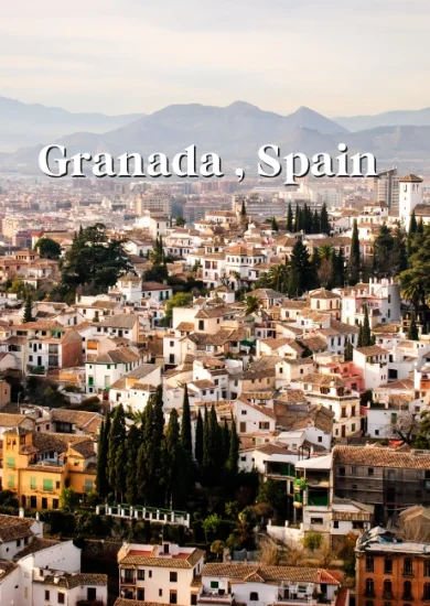 Scenic view of Granada, Spain, with historic buildings and the Sierra Nevada mountains in the background - 3 Day Travel Guide and Itinerary Granada Spain