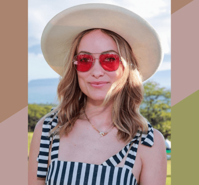 olivia wilde with a red sunglasses and a hat